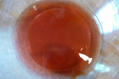 Red wine vinegar in a glass bowl.