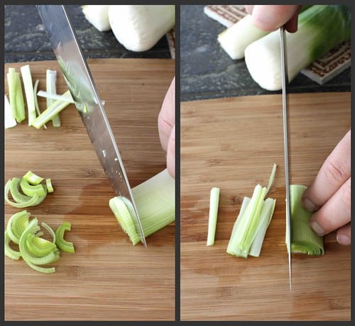 Cutting a leek with a large knife.