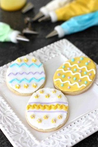 A variety of sugar cookies decorated like Easter eggs.