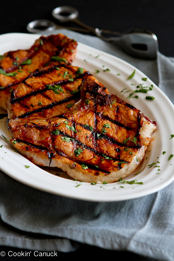 Grilled Pineapple Chili Pork Chops...No more boring and dry pork chops. These are amazing! | cookincanuck.com #recipe #dinner