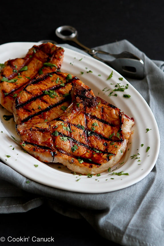 Grilled Pineapple Chili Pork Chops...No more boring and dry pork chops. These are amazing! | cookincanuck.com #recipe #dinner