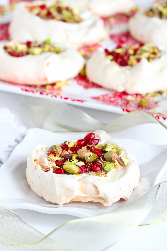 Light Meringues with Pomegranate and Pistachios...A low-fat and easy make-ahead dessert. 98 calories and 4 Weight Watchers Freestyle SP #recipe #dessert