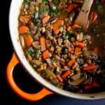 The flavors in this vegan Hearty Mushroom, Farro & Ginger Soup are not to be missed! 247 calories and 4 Weight Watchers Freestyle SP #vegan