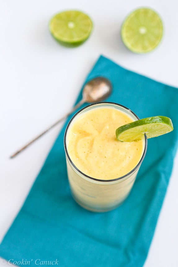 Tropical Mango & Pineapple Smoothie Recipe...A touch of the tropics in a glass. | cookincanuck.com