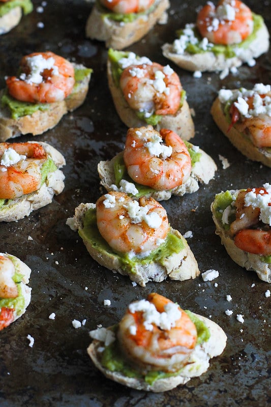 Easy Guacamole Spiced Shrimp Crostini recipe…These will disappear in minutes at your Super Bowl party! 44 calories and 1 Weight Watcher SmartPoints