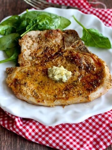 Herbed Pork Chops with Garlic Butter…Pork chops never tasted so good! 283 calories and 6 Weight Watchers Freestyle SP