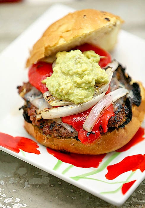15 Healthy Burger Recipes, Meat and Meatless.  Everything from beef and turkey to salmon and black.  There's something for everyone! Stuffed Mushroom Burger with Guacamole and Red Peppers