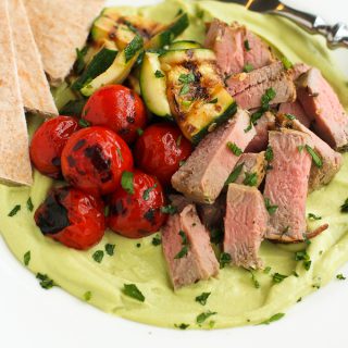 This grilled pork tenderloin recipe is like no other. Pair it with broccoli cheddar hummus and grilled veggies on a tasty dinner platter. 366 calories and 6 Weight Watchers Freestyle SP #pork #hummus #cleaneating