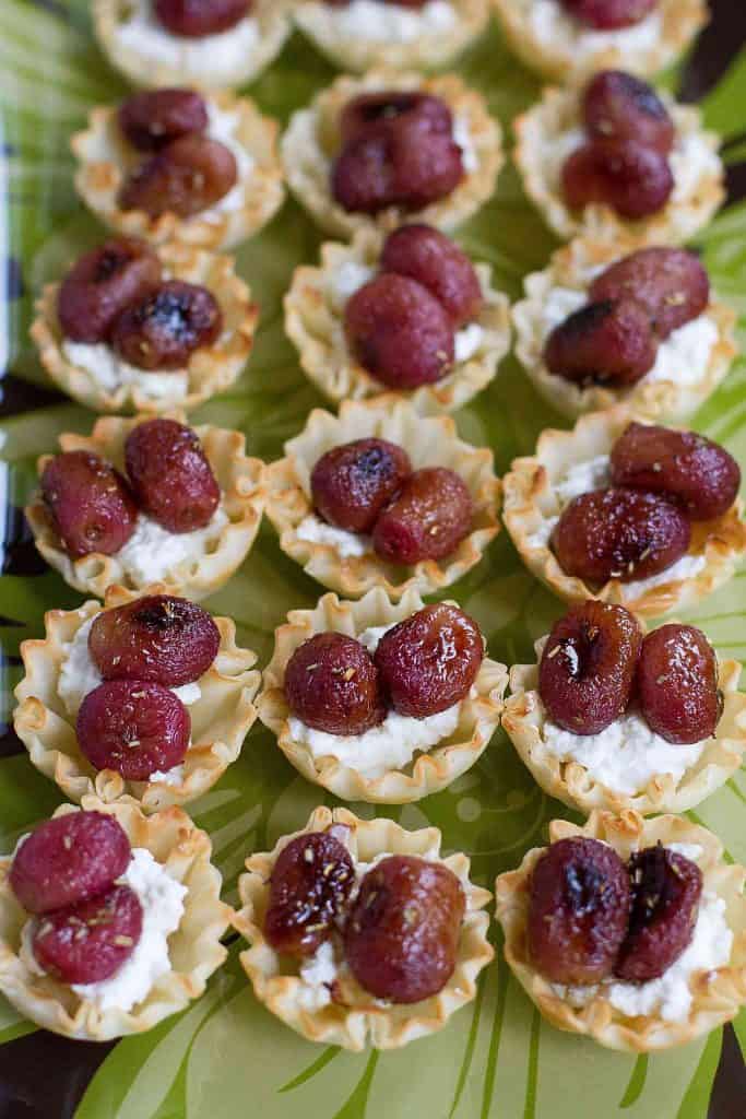 There is a wonderful balance of sweet and savory in these Roasted Grape and Ricotta Phyllo Cups. The perfect appetizer bites! 57 calories and 1 Weight Watchers SmartPoints