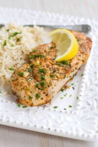 It doesn't get any easier than these Herb Lemon Baked Pork Chops! Tender and absolutely delicious, serve these up with rice and veggies, or on a salad! 271 calories and 4 Weight Watchers Freestyle SP #weightwatchers #cleaneating