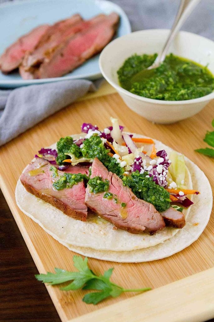 Taco Tuesday gets a whole new look with these Grilled Chimichurri Steak Tacos. The flavor of the sauce is to die for! 399 calories and 10 Weight Watchers Freestyle SP