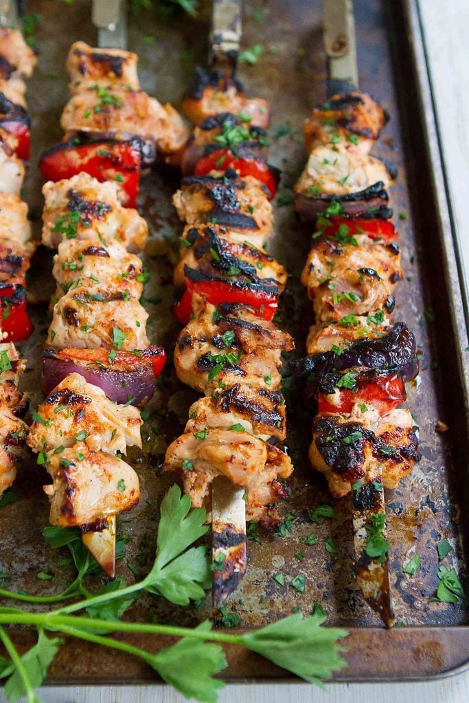One of my favorite grilling recipes! These Smoked Paprika Chicken Kabobs are marinated in a spiced yogurt sauce, which makes them incredibly tender and delicious. 237 calories and 4 Weight Watchers SP | Thighs | Grilled | Baked | Marinade | On the grill