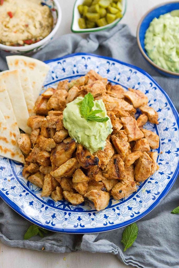 This Grilled Chicken Shawarma with Avocado Tzatziki is fantastic on its own or when served up with pita bread and hummus! 300 calories and 3 Weight Watchers Freestyle SP