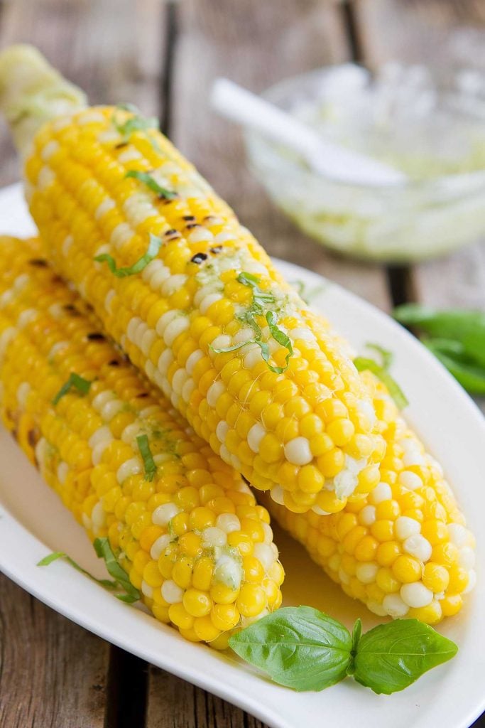 Pesto Butter Corn on the Cob is the perfect summertime side dish recipe! Only 4 ingredients needed. 118 calories and 2 Weight Watchers Freestyle SP