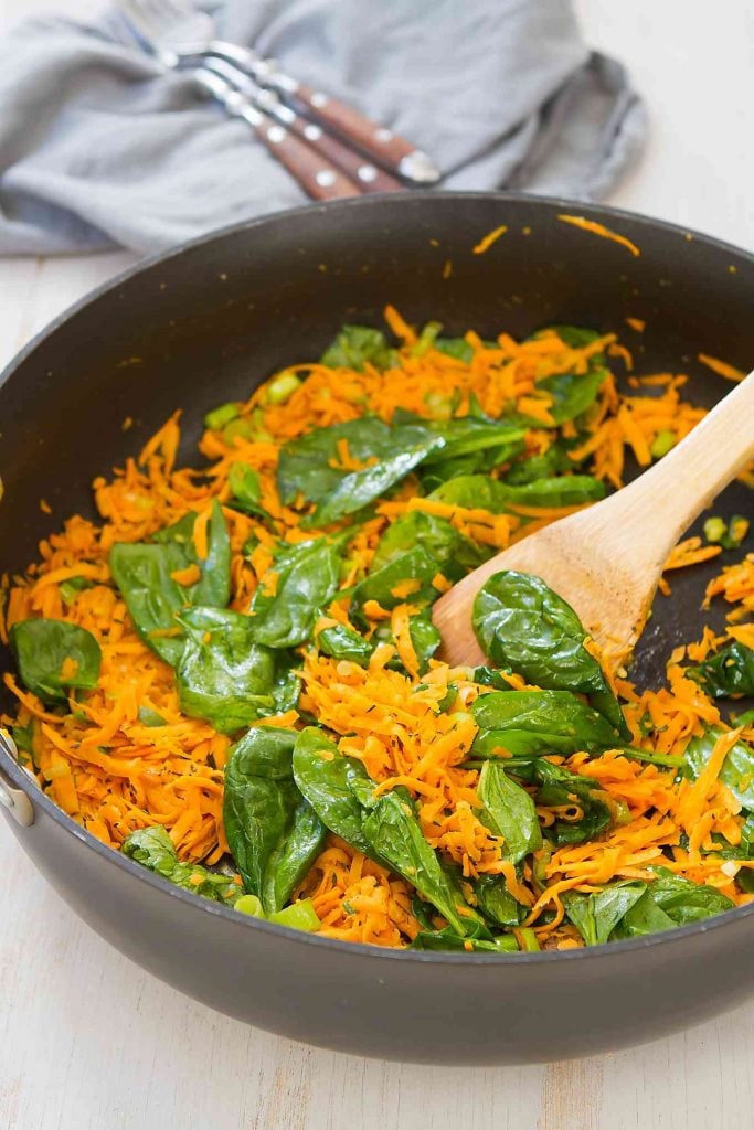 A little sweet and wonderfully garlicky, this Sautéed Sweet Potato and Spinach side dish is packed with vitamins and can be prepared in 10 minutes. 99 calories and 4 Weight Watchers Freestyle SP