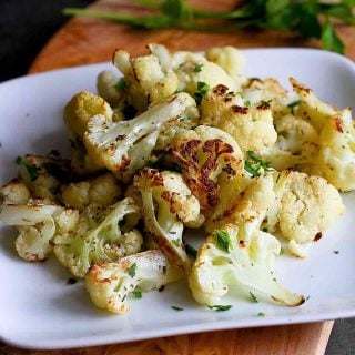 Take the classic flavors of rosemary roasted potatoes and turn them into a fantastic spicy roasted cauliflower side dish that’s both healthy and irresistibly tasty. 78 calories and 1 Weight Watchers Freestyle SP #cauliflower #weightwatchers