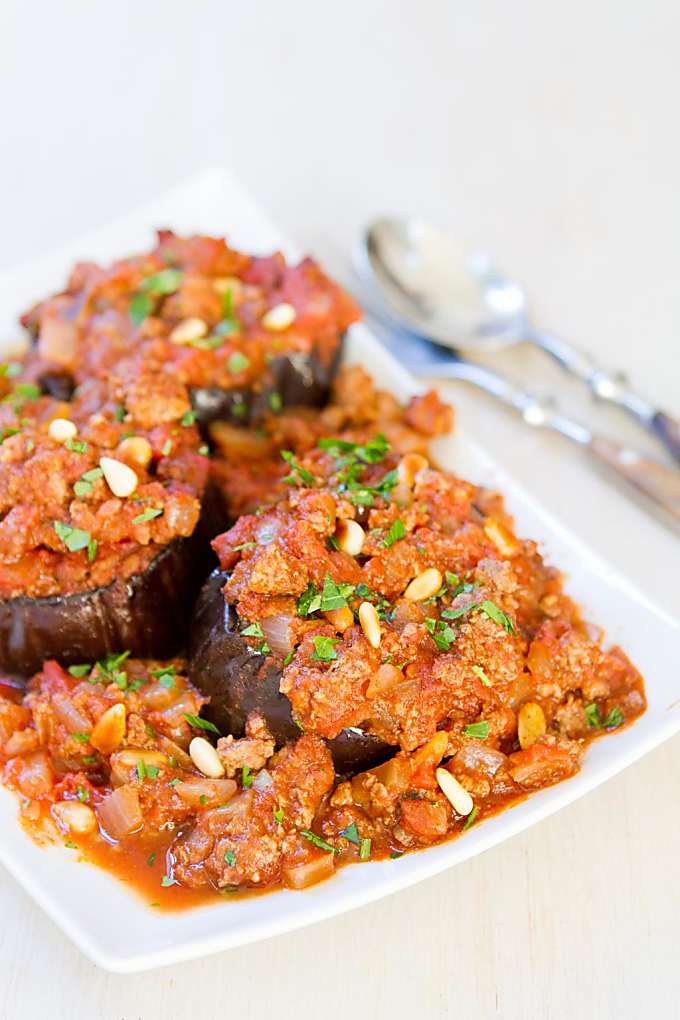 This Syrian meat dish, served over baked eggplant round, is wonderfully spiced and delicious! 330 calories