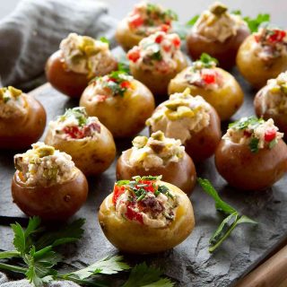 These Greek-inspired Mini Goat Cheese Stuffed Potato Appetizers have 2 amazing options - sweet and savory. Great for entertaining! 79 calories and 3 Weight Watchers SmartPoints