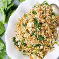 This Sauteed Cauliflower Rice is packed with savory sweet caramelized onions and spinach, and topped with salty feta cheese. 76 calories and 2 Weight Watchers Freestyle SP