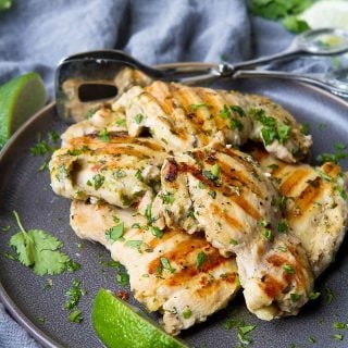 There's nothing easier than whipping up a batch of this Grilled Cilantro Lime Chicken for dinner! Plus, it can be made ahead and frozen. 217 calories and 3 Weight Watchers Freestyle SP