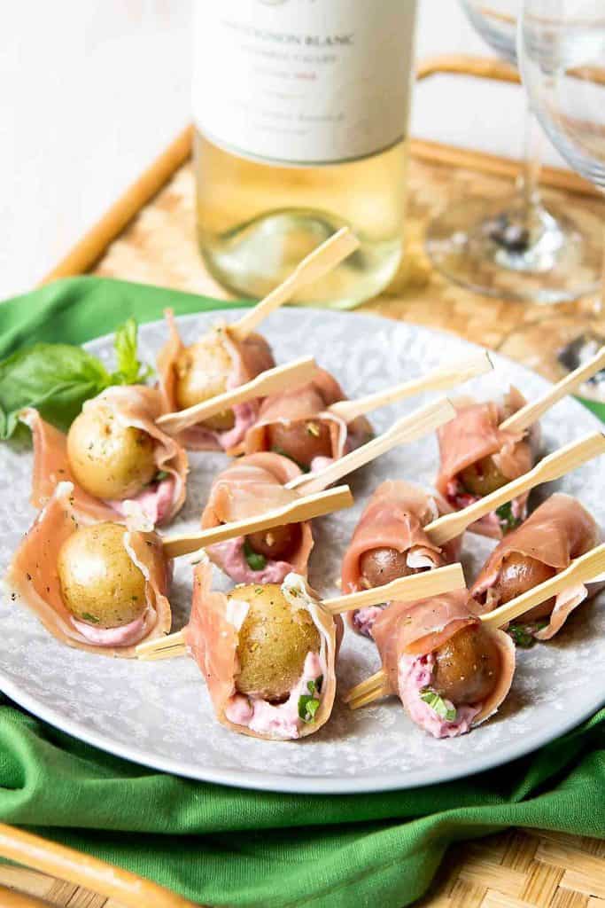 Perfectly bite-sized and delicious, these prosciutto potato skewers have the perfect balance of sweet and savory, thanks to some cherry goat cheese. 41 calories and 2 Weight Watchers Freestyle SP. #appetizer #vegetarian