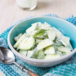 This is one of the easiest summertime salads you can make! This creamy cucumber salad is dressed with a light dill yogurt dressing. 24 calories and 0 Weight Watchers Freestyle SP #salad #cucumber #recipe