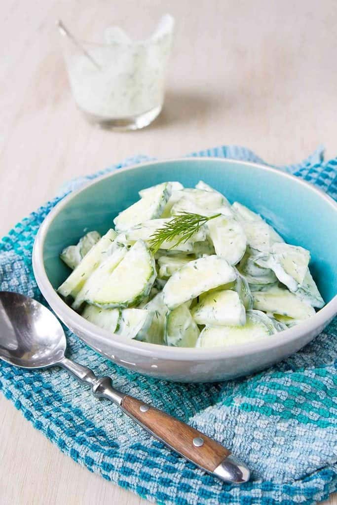 This is one of the easiest summertime salads you can make! This creamy cucumber salad is dressed with a light dill yogurt dressing. 24 calories and 0 Weight Watchers Freestyle SP #salad #cucumber #recipe