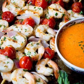 My favorite summertime grilling food - Grilled Shrimp Kabobs! These simple skewers take less than 20 minutes to make. Perfect for appetizers or dinner. 161 calories and 1 Weight Watchers Freestyle SP #shrimp #kabobs #grilled #healthy