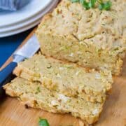 This is not your standard zucchini bread recipe! Savory and filled with caramelized shallots and feta cheese, this savory bread is the perfect snack bread or side dish. 191 calories and 5 Weight Watchers Freestyle SP #zucchinibread #healthy #cleaneating #recipe