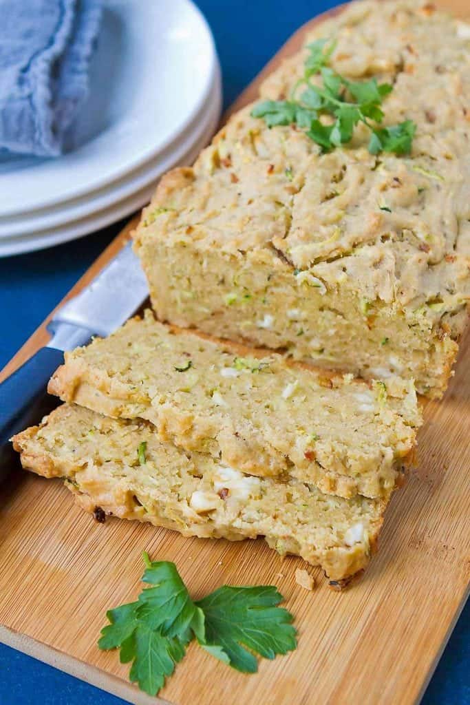 This is not your standard zucchini bread recipe! Savory and filled with caramelized shallots and feta cheese, this savory bread is the perfect snack bread or side dish. 191 calories and 5 Weight Watchers Freestyle SP #zucchinibread #healthy #cleaneating #recipe
