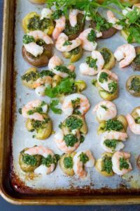 Easy clean up and tons of flavor in this Chimichurri Shrimp and Potato Sheet Pan Meal. Another healthy weeknight dinner idea. 381 calories and 8 Weight Watchers Freestyle SP