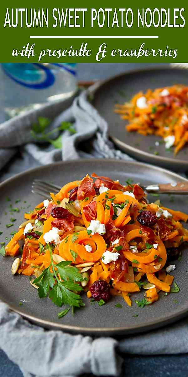Spiralized sweet potato noodles are dressed up with crispy prosciutto, goat cheese and dried cranberries. The perfect fall side dish recipe! 167 calories and 6 Weight Watchers Freestyle SP #sweetpotato #sidedish #cleaneating