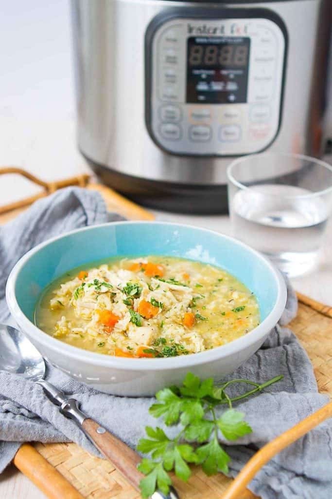Chicken and Rice Soup is one of our favorite comfort meals and it comes together so easily in the Instant Pot! 241 calories and 5 Weight Watchers Freestyle SP #instantpot #soup #cleaneating