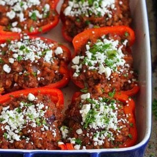 You just can't beat a healthy meal of stuffed peppers, especially when they're filled with classic Greek flavors! 226 calories and 5 Weight Watchers Freestyle SP #recipe #dinner
