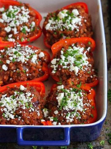 You just can't beat a healthy meal of stuffed peppers, especially when they're filled with classic Greek flavors! 226 calories and 5 Weight Watchers Freestyle SP #recipe #dinner
