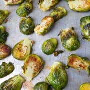 If you have always wondered how to roast Brussels sprouts, this tutorial is for you! Roasted Brussels sprouts are the ultimate fall or holiday side dish! #Brusselssprouts #cleaneating #howto