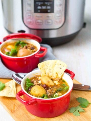 Your family is going to love this one! Instant Pot Taco Soup with Potatoes is a breeze to make and chockfull of flavor. 267 calories and 4 Weight Watchers Freestyle SP #instantpot #soup #cleaneating