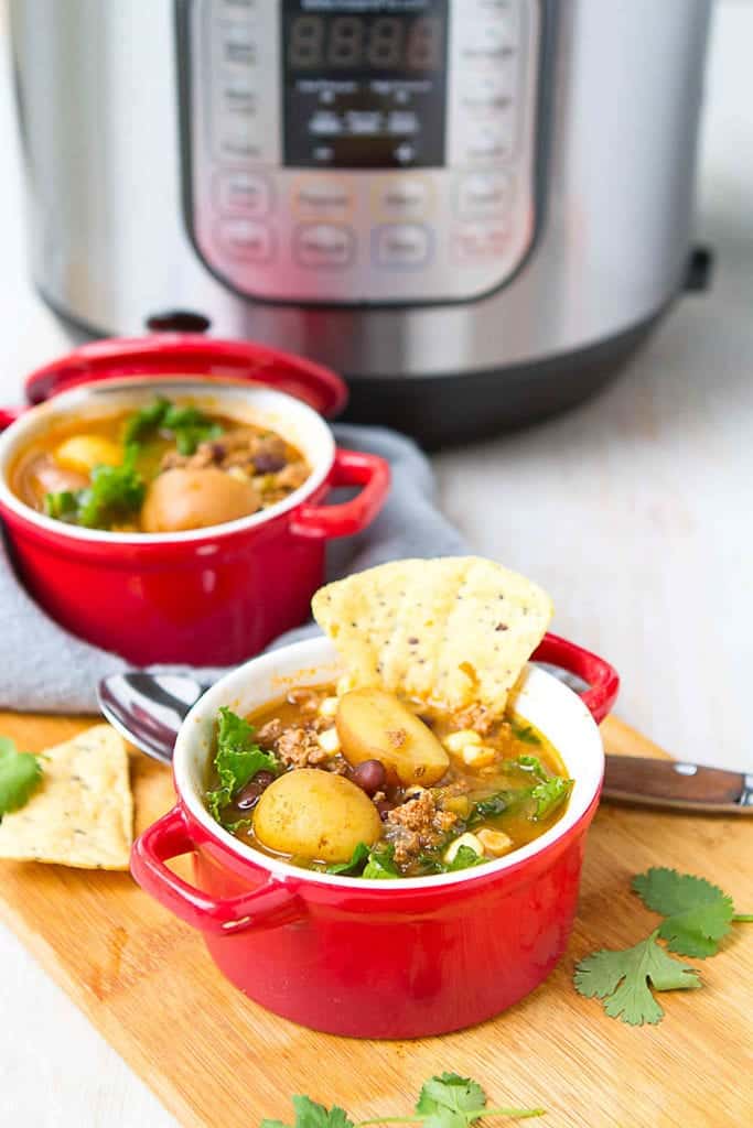 Your family is going to love this one! Instant Pot Taco Soup with Potatoes is a breeze to make and chockfull of flavor. 267 calories and 4 Weight Watchers Freestyle SP #instantpot #soup #cleaneating
