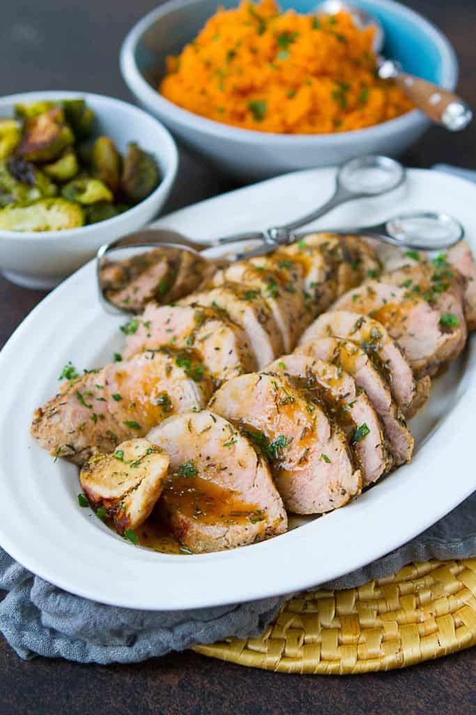 Roasted Pork Tenderloin makes for an easy, but impressive dinner for entertaining or a busy weeknight. The maple Dijon sauce lends just the right amount of savory sweet flavors. 250 calories and 4 Weight Watchers Freestyle SP #pork #porktenderloin #recipe