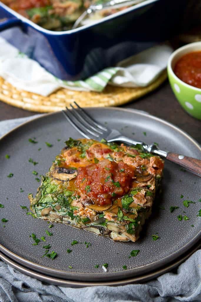 Pack some veggies into your morning with this healthy breakfast egg casserole. A scoop of salsa mixed into the eggs adds some kick! Great for a light dinner, too. 113 calories and 1 Weight Watchers Freestyle SP #vegetarian #cleaneating #brunch