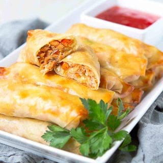 Delicious and light Baked Teriyaki Salmon Egg Rolls are inspired by the city where I grew up - Vancouver, Canada. Celebrating my amazing hometown these easy appetizers! 183 calories and 2 Weight Watchers Freestyle SP #eggrolls #salmon #weightwatchers