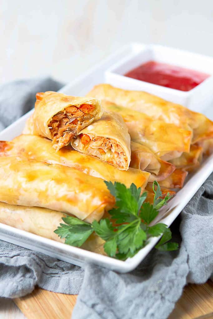 Delicious and light Baked Teriyaki Salmon Egg Rolls are inspired by the city where I grew up - Vancouver, Canada. Celebrating my amazing hometown with these easy appetizers! 183 calories and 2 Weight Watchers Freestyle SP #eggrolls #salmon #weightwatchers