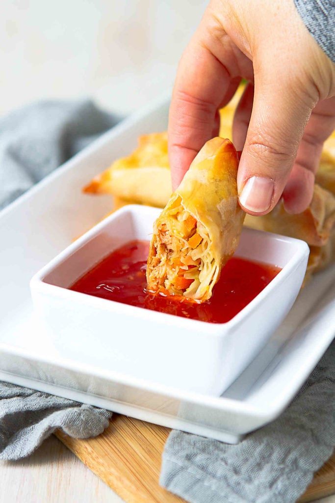 Elevate your appetizer game with these light Baked Teriyaki Salmon Egg Rolls. So many fantastic flavors with a fraction of the fat! 183 calories and 2 Weight Watchers Freestyle SP #eggroll #salmonrecipes #appetizer #weightwatchersrecipes