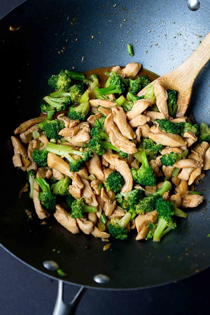 Chicken stir fry is one of the easiest meals you can throw together at the last minute! This chicken and broccoli version uses minimal oil and is packed with flavor and nutrients. 304 calories and 2 Weight Watchers Freestyle SP #stirfry #weightwatchers