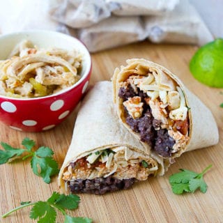 The ultimate food prep recipe - freezer burritos! And even better? The components are made in the Instant Pot. Great to have on hand for lunches or last-minute dinners. 285 calories and 5 Weight Watchers Freestyle SP #pressurecooker #weightwatchers