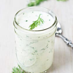 Buttermilk dressing is a great way to add some decadence to a salad without going overboard on calories and fat. This one is flavored with Dijon and dill, and is just 19 calories and 0 Weight Watchers Freestyle SP for 2 tablespoons! #dressing #weightwatchers