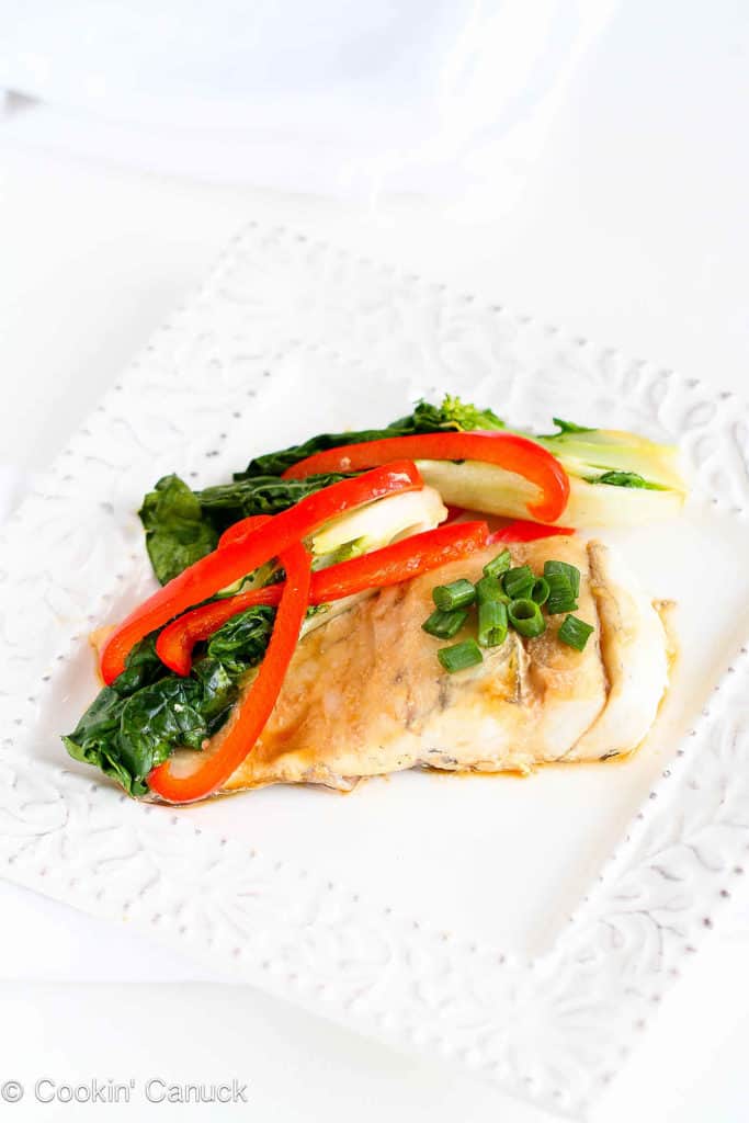 There's no easier way to cook fish than tucked in a foil package, alongside healthy vegetables. Barramundi, a sustainable fish, takes the starring role. 197 calories and 1 Weight Watchers Freestyle SP  #weightwatchers #fish #easydinner