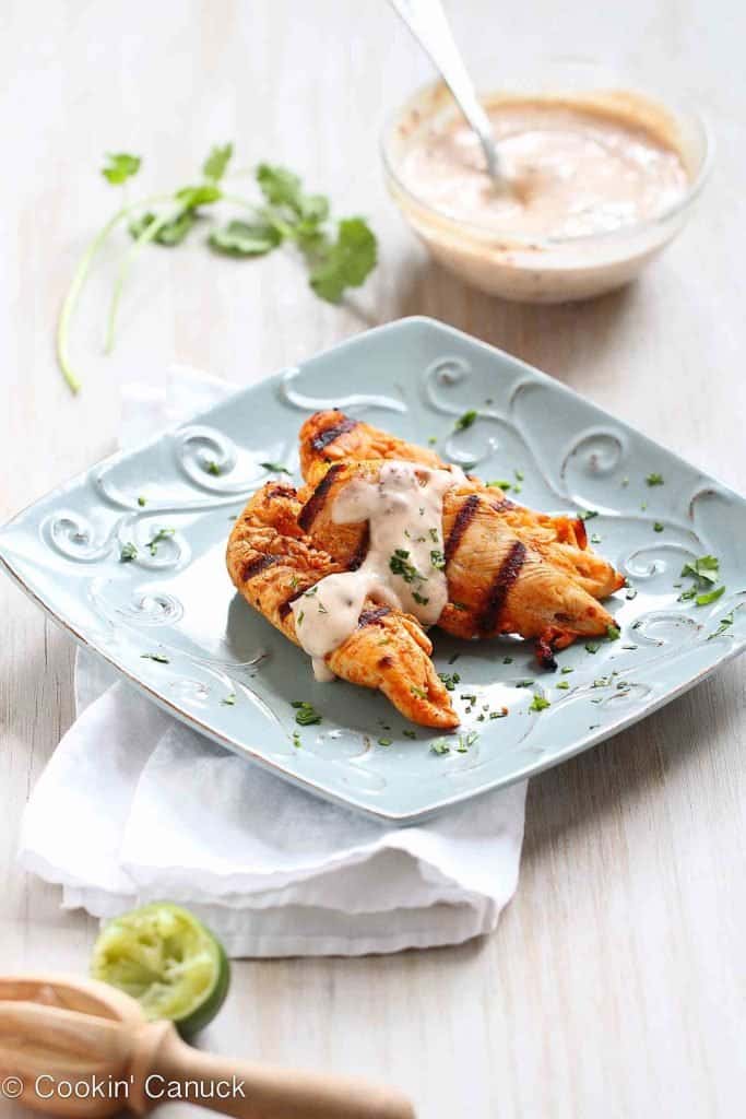 This quick and easy grilled chicken tenders recipe is taken from plain to phenomenal with the addition of a crave-worthy chipotle lime yogurt. 179 calories and 2 Weight Watchers Freestyle SP #chickenrecipes #weightwatchers