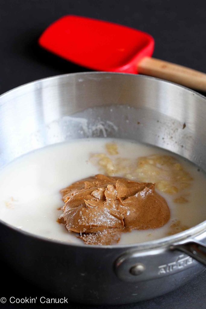 Almond butter and almond milk in a small saucepan.
