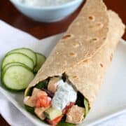 Whip up this tasty low-fat Greek Chicken Salad Wrap in less than 15 minutes. It's packed with vegetables and feta cheese for a satisfying lunch. 184 calories and 2 Weight Watchers Freestyle SP #chickensalad #weightwatchers